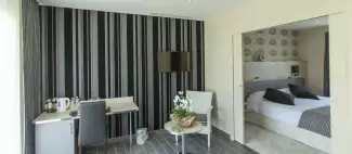Hôtel Auberge Bienvenue - Chambre confortable et spacieuse_1