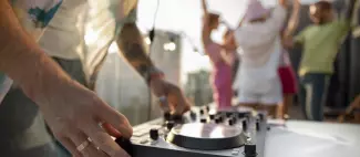 man-being-dj-party-side-view