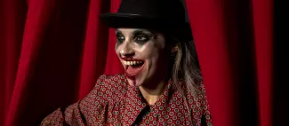 side-view-halloween-make-up-woman-laughing