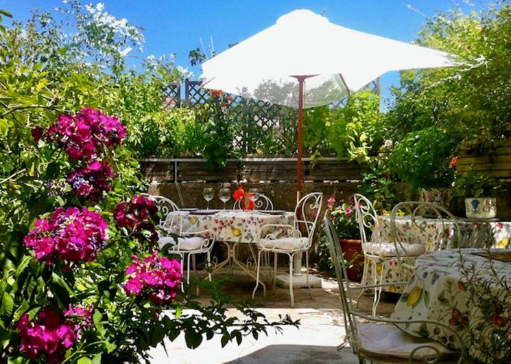 The flower-filled terrace for dinner and breakfast