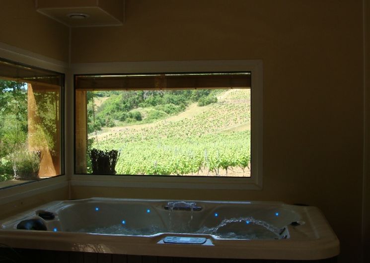 Espace bien-être avec jacuzzi et sauna - Location insolite Aveyron