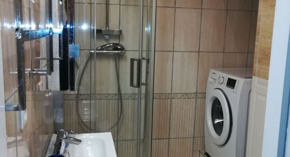 La salle de douche buanderie tz-de-chaussée