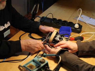 Atelier de réparation au marché de Murat