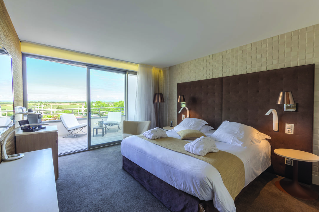 Oz'Inn Hôtel & Spa situé au Cap d'Agde - Chambre Premium - Dernier étage
