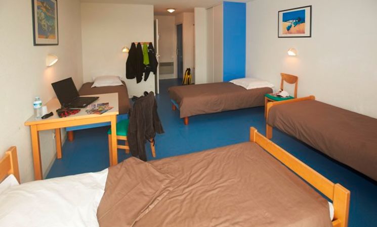 Une chambre de 4 lits de la Résidence de Kerguelen Sports Océan à Larmor Plage, proche Lorient Bretagne Sud (Morbihan, 56)