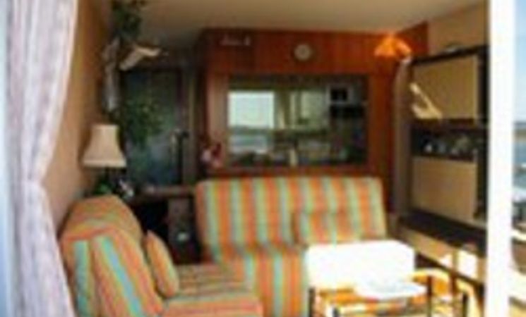 Appartement 4 personnes à Guidel-Plages avec espace salon cosy et lumineux donnant sur la mer et les plages (Morbihan, 56)